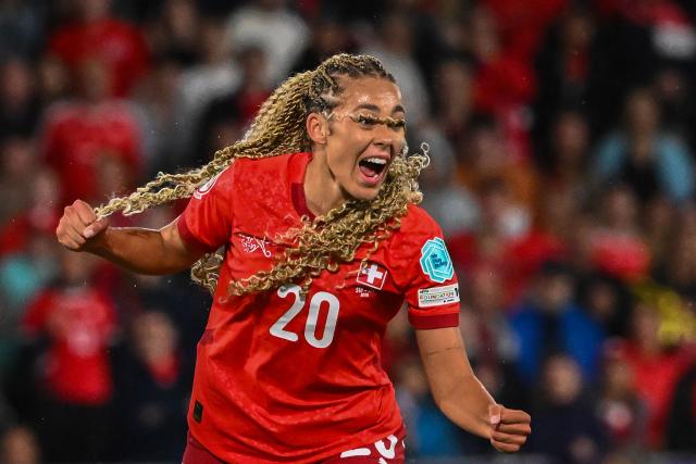 TOPSHOT - Switzerland's forward #20 Alayah Pilgrim celebrates after scoring the second goal of the match during the UEFA Women's Euro 2025 Group A football match between Switzerland and Iceland at the Wankdorf stadium in Bern, on July 6, 2025. (Photo by SEBASTIEN BOZON / AFP)