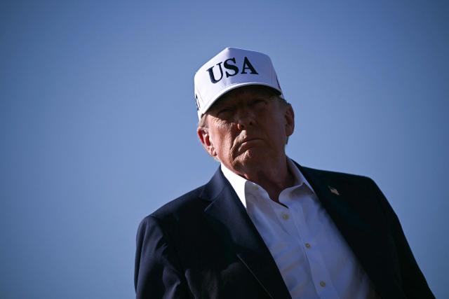 US President Donald Trump speaks to reporters before boarding Air Force One at Morristown Municipal Airport in Morristown, New Jersey, on July 6, 2025, en route to Washington after spending the weekend at his residence in Bedminster, New Jersey. (Photo by Brendan SMIALOWSKI / AFP)