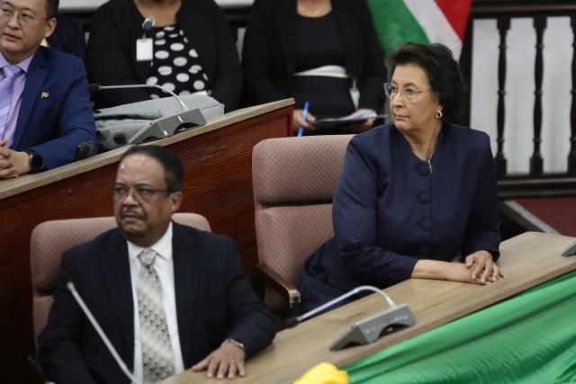 Suriname's opposition leader Jennifer Geerlings-Simons (R) looks on during the National Assembly election in Paramaribo on July 6, 2025. Lawmakers elected Jennifer Geerlings-Simons as Suriname's first woman president on July 6, 2025, after her party won the most seats in legislative elections in May. (Photo by Ranu Abhelakh / AFP)
