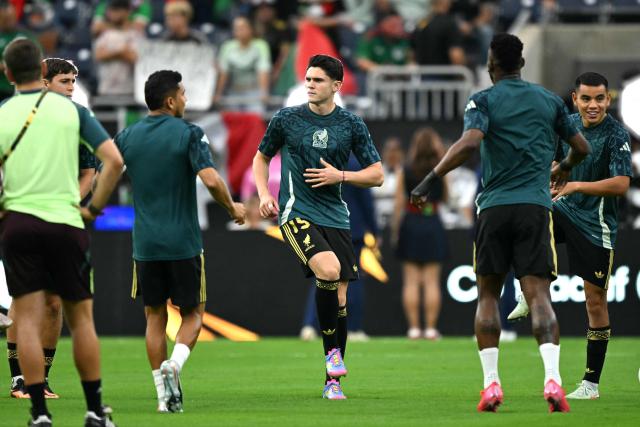 Mexico's defender #15 Israel Reyes warms up ahead of the Concacaf Gold Cup final football match between Mexico and USA at NRG Stadium in Houston, Texas on July 6, 2025. (Photo by CHANDAN KHANNA / AFP)