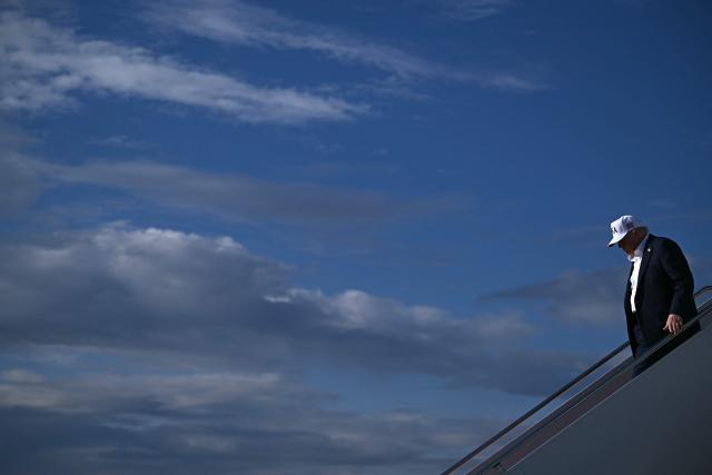 US President Donald Trump steps off Air Force One upon arrival at Joint Base Andrews in Maryland, on July 6, 2025, after spending the weekend at his residence in Bedminster, New Jersey. (Photo by Brendan SMIALOWSKI / AFP)
