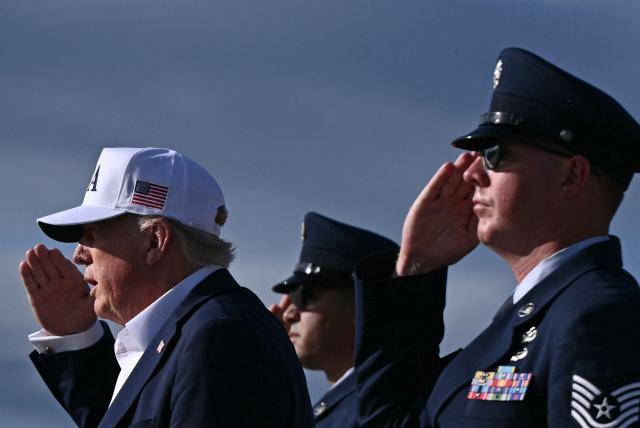 US President Donald Trump steps off Air Force One upon arrival at Joint Base Andrews in Maryland, on July 6, 2025, after spending the weekend at his residence in Bedminster, New Jersey. (Photo by Brendan SMIALOWSKI / AFP)