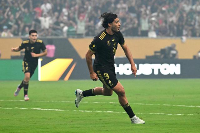 Mexico's forward #09 Raul Jimenez celebrates scoring his team's first goal during the Concacaf Gold Cup final football match between Mexico and USA at NRG Stadium in Houston, Texas on July 6, 2025. (Photo by Chandan Khanna / AFP)