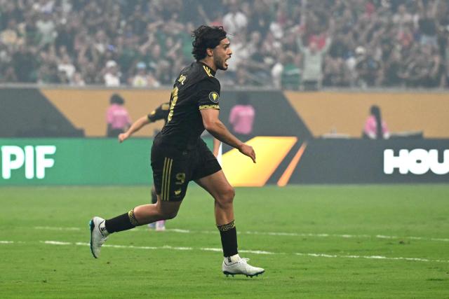 Mexico's forward #09 Raul Jimenez celebrates scoring his team's first goal during the Concacaf Gold Cup final football match between Mexico and USA at NRG Stadium in Houston, Texas on July 6, 2025. (Photo by Chandan Khanna / AFP)