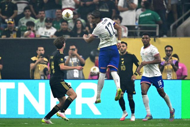 United States' midfielder #17 Malik Tillman heads the ball during the Concacaf Gold Cup final football match between Mexico and USA at NRG Stadium in Houston, Texas on July 6, 2025. (Photo by CHANDAN KHANNA / AFP)