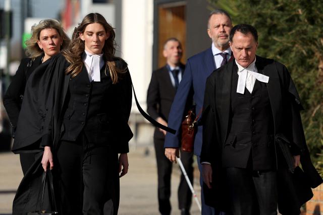 Lead barrister Colin Mandy (R) arrives with (L-R) Lawyer Ophelia Holloway, Barrister Sophie Stafford and Lawyer Bill Doogue at the Latrobe Valley Magistrates' Court in Morwell on July 7, 2025. An Australian woman murdered her husband's parents and aunt by lacing their beef Wellington lunch with toxic mushrooms, a jury found on July 7 at the climax of a trial watched around the world. Keen home cook Erin Patterson hosted an intimate meal in July 2023 that started with good-natured banter and earnest prayer -- but ended with three guests dead. (Photo by MARTIN KEEP / AFP)