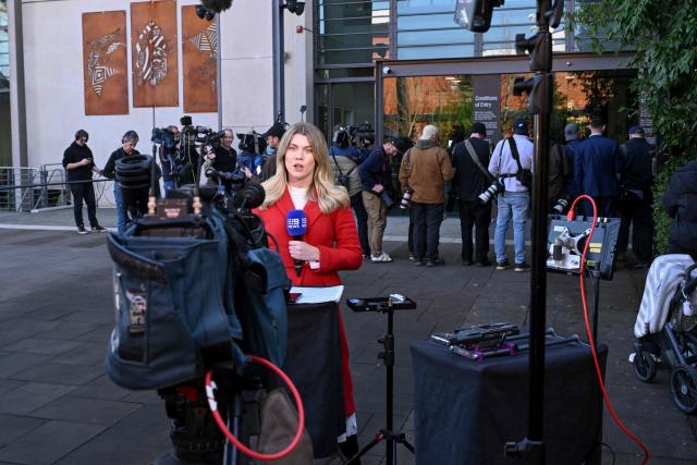 Members of the media are seen outside the Latrobe Valley Magistrates' Court in Morwell on July 7, 2025. An Australian woman murdered her husband's parents and aunt by lacing their beef Wellington lunch with toxic mushrooms, a jury found on July 7 at the climax of a trial watched around the world. Keen home cook Erin Patterson hosted an intimate meal in July 2023 that started with good-natured banter and earnest prayer -- but ended with three guests dead. (Photo by WILLIAM WEST / AFP)