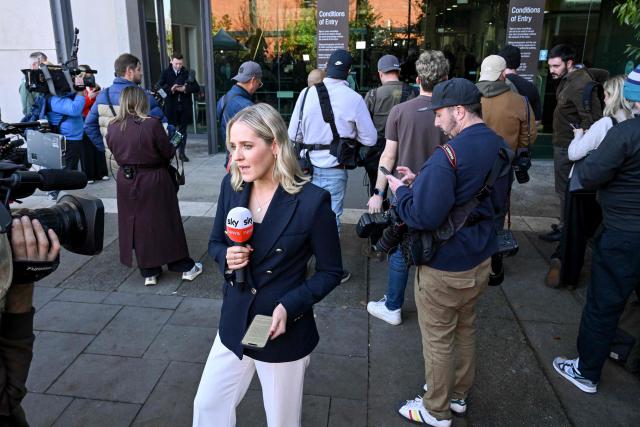 Members of the media are seen outside the Latrobe Valley Magistrates' Court in Morwell on July 7, 2025. An Australian woman murdered her husband's parents and aunt by lacing their beef Wellington lunch with toxic mushrooms, a jury found on July 7 at the climax of a trial watched around the world. Keen home cook Erin Patterson hosted an intimate meal in July 2023 that started with good-natured banter and earnest prayer -- but ended with three guests dead. (Photo by WILLIAM WEST / AFP)