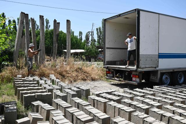 A view of the production facility of rice construction blocks, made mostly of rice husks - a byproduct of rice processing, in the Batken region in southern Kyrgyzstan on May 22, 2025. (Photo by Guliza Urustambek kyzy / AFP)