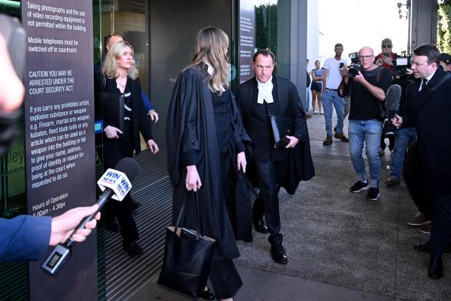 Lead barrister Colin Mandy (R) leaves the Latrobe Valley Magistrates' Court with Barrister Sophie Stafford (C) and Lawyer Ophelia Holloway (L) in Morwell on July 7, 2025. An Australian woman murdered her husband's parents and aunt by lacing their beef Wellington lunch with toxic mushrooms, a jury found on July 7 at the climax of a trial watched around the world. Keen home cook Erin Patterson hosted an intimate meal in July 2023 that started with good-natured banter and earnest prayer -- but ended with three guests dead. (Photo by WILLIAM WEST / AFP)