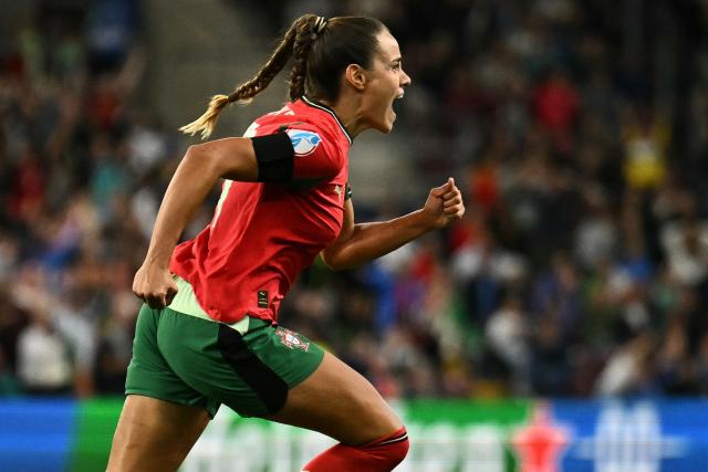 Portugal's defender #19 Diana Gomes celebrates after scoring Portugal's first goal during the UEFA Women's Euro 2025 Group B football match between Portugal and Italy at the Stade de Geneve in Geneva, on July 7, 2025. (Photo by Fabrice COFFRINI / AFP)