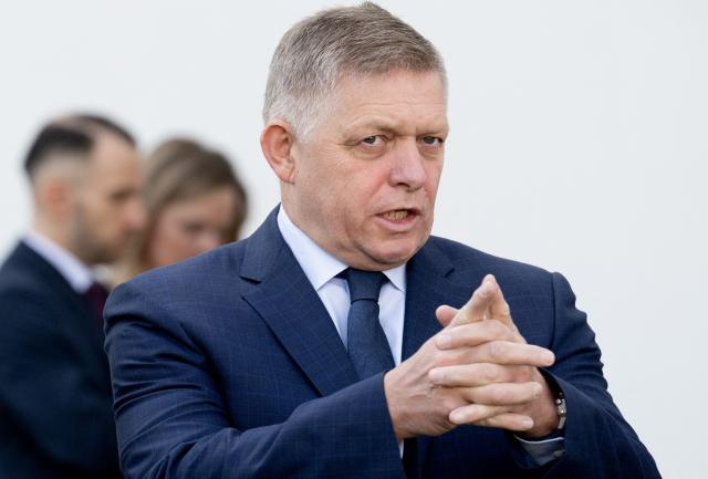 (FILES) In this file photo taken on October 22, 2024 Slovakia’s Prime Minister Robert Fico gestures prior to a trilateral meeting of Slovakia, Serbia and Hungary in Komarno, Slovakia. The man who admitted to shooting Slovak Prime Minister Robert Fico is due to stand trial on terror charges on July 7, 2025 in the central Slovak city of Banska Bystrica, more than a year after the attack shocked the central European country. (Photo by JOE KLAMAR / AFP)