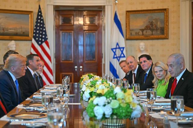 US President Donald Trump meets with Israeli Prime Minister Benjamin Netanyahu at the Blue Room of the White House in Washington, DC, on July 7, 2025. Prime Minister Netanyahu will meet Monday with President Trump, who expressed hope for a "deal this week" between Israel and Hamas that sees hostages released from the Gaza Strip. Indirect negotiations between Israel and Hamas began on July 6 in Doha, aiming to broker a ceasefire and reach an agreement on the release of hostages in exchange for Palestinian prisoners. (Photo by ANDREW CABALLERO-REYNOLDS / AFP)