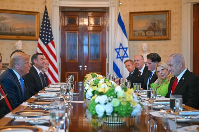 US President Donald Trump meets with Israeli Prime Minister Benjamin Netanyahu at the Blue Room of the White House in Washington, DC, on July 7, 2025. Prime Minister Netanyahu will meet Monday with President Trump, who expressed hope for a "deal this week" between Israel and Hamas that sees hostages released from the Gaza Strip. Indirect negotiations between Israel and Hamas began on July 6 in Doha, aiming to broker a ceasefire and reach an agreement on the release of hostages in exchange for Palestinian prisoners. (Photo by ANDREW CABALLERO-REYNOLDS / AFP)