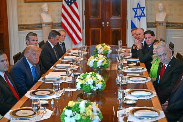US President Donald Trump meets with Israeli Prime Minister Benjamin Netanyahu at the Blue Room of the White House in Washington, DC, on July 7, 2025. Prime Minister Netanyahu will meet Monday with President Trump, who expressed hope for a "deal this week" between Israel and Hamas that sees hostages released from the Gaza Strip. Indirect negotiations between Israel and Hamas began on July 6 in Doha, aiming to broker a ceasefire and reach an agreement on the release of hostages in exchange for Palestinian prisoners. (Photo by ANDREW CABALLERO-REYNOLDS / AFP)