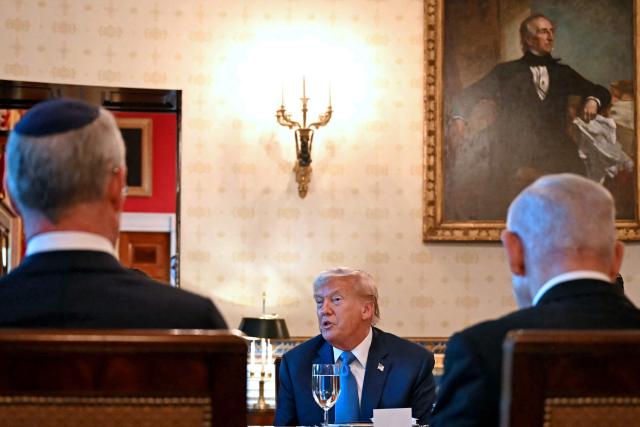 US President Donald Trump meets with Israeli Prime Minister Benjamin Netanyahu (R) at the Blue Room of the White House in Washington, DC, on July 7, 2025. Prime Minister Netanyahu will meet Monday with President Trump, who expressed hope for a "deal this week" between Israel and Hamas that sees hostages released from the Gaza Strip. Indirect negotiations between Israel and Hamas began on July 6 in Doha, aiming to broker a ceasefire and reach an agreement on the release of hostages in exchange for Palestinian prisoners. (Photo by ANDREW CABALLERO-REYNOLDS / AFP)