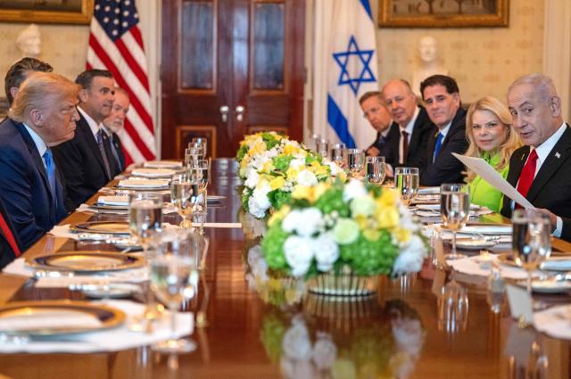 US President Donald Trump meets with Israeli Prime Minister Benjamin Netanyahu at the Blue Room of the White House in Washington, DC, on July 7, 2025. Prime Minister Netanyahu will meet Monday with President Trump, who expressed hope for a "deal this week" between Israel and Hamas that sees hostages released from the Gaza Strip. Indirect negotiations between Israel and Hamas began on July 6 in Doha, aiming to broker a ceasefire and reach an agreement on the release of hostages in exchange for Palestinian prisoners. (Photo by ANDREW CABALLERO-REYNOLDS / AFP)