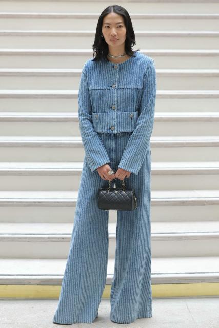 US film director Constance Tsang poses upon arrival ahead of the Chanel's Haute-Couture Fall/Winter 2025-26 collection show in Paris on July 8, 2025. (Photo by Thomas SAMSON / AFP)