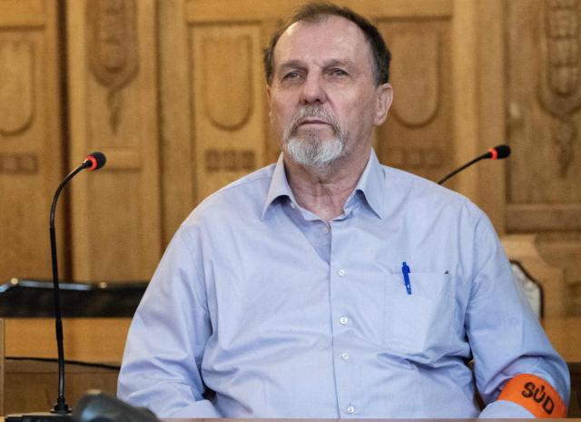 Defendant Juraj Cintula, a 72-year-old poet, sits in the courtroom in Banska Bystrica, Slovakia, on July 8, 2025, before the start of his trial where he is accused of shooting Slovakia's Prime Minister Robert Fico (unseen) on May 15, 2024. The man who admitted to shooting Slovak Prime Minister Robert Fico is due to stand trial on terror charges on July 7, 2025 in the central Slovak city of Banska Bystrica, more than a year after the attack shocked the central European country. Detained at the scene, Juraj Cintula, a 72-year-old poet, who has admitted to shooting the leader with the intention to wound but not kill him, is facing up to life in prison if convicted. (Photo by Joe Klamar / AFP)