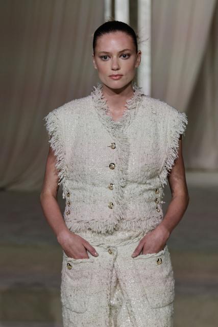 A model presents a creation for Chanel during the Women's Haute-Couture Fall/Winter 2025-26 collection show in Paris, on July 8, 2025. (Photo by STEPHANE DE SAKUTIN / AFP)