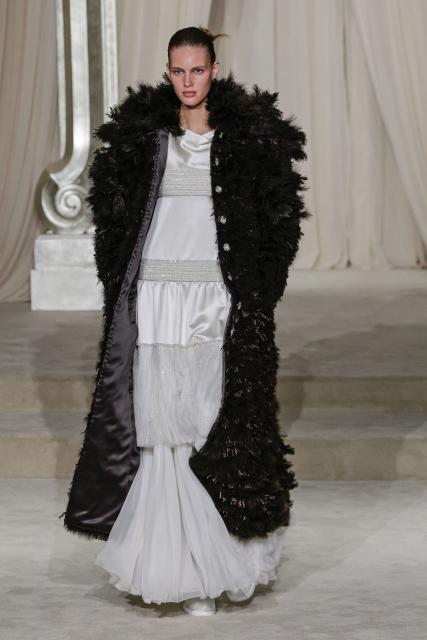 A model presents a creation for Chanel during the Women's Haute-Couture Fall/Winter 2025-26 collection show in Paris, on July 8, 2025. (Photo by STEPHANE DE SAKUTIN / AFP)