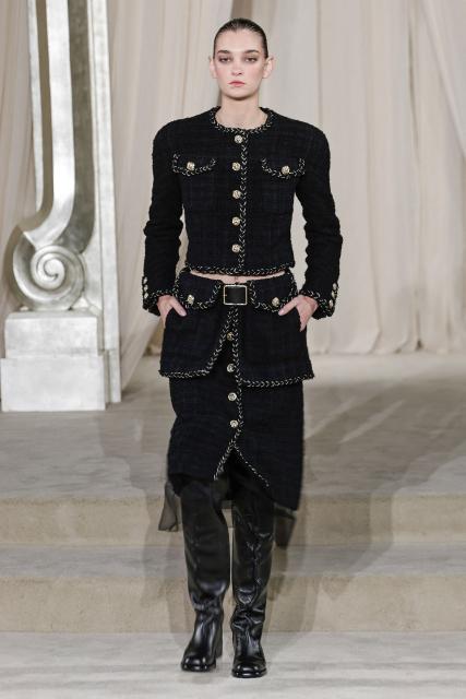 A model presents a creation for Chanel during the Women's Haute-Couture Fall/Winter 2025-26 collection show in Paris, on July 8, 2025. (Photo by STEPHANE DE SAKUTIN / AFP)