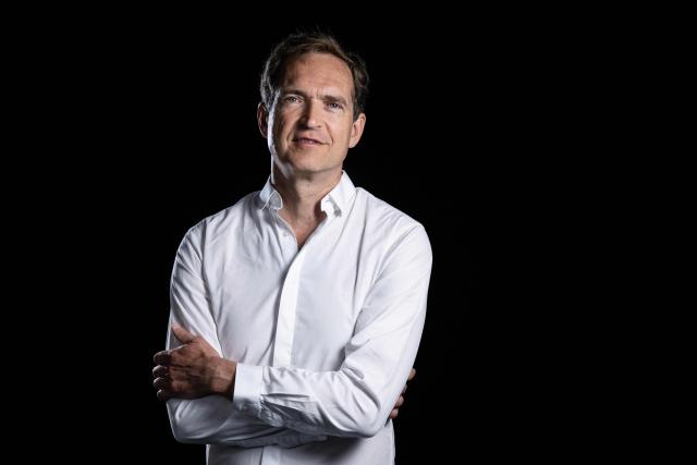 French author Fabrice Humbert poses during a photo session in Paris on July 7, 2025. (Photo by JULIEN DE ROSA / AFP)