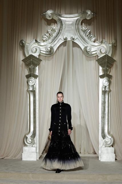 A model presents a creation for Chanel during the Women's Haute-Couture Fall/Winter 2025-26 collection show in Paris, on July 8, 2025. (Photo by STEPHANE DE SAKUTIN / AFP)