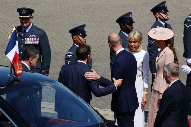 France's President Emmanuel Macron and his wife Brigitte Macron are greeted by Britain's Prince William, Prince of Wales and Britain's Catherine, Princess of Wales upon arrival at RAF Northolt, west of London, on July 8, 2025, on the first day of a three-day state visit to Britain. French President Emmanuel Macron begans a three-day state visit to Britain on July 8, 2025, which will see him address parliament and try to rekindle a purportedly warm relationship with King Charles III. (Photo by Gonzalo Fuentes / POOL / AFP)
