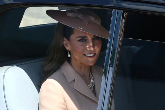 Britain's Catherine, Princess of Wales leaves by car after greeting France's President Emmanuel Macron and his wife Brigitte Macron upon their arrival at RAF Northolt, west of London, on July 8, 2025, on the first day of a three-day state visit to Britain. French President Emmanuel Macron began a three-day state visit to Britain on Tuesday, which will see him address parliament and try to rekindle a purportedly warm relationship with King Charles III. (Photo by Gonzalo Fuentes / POOL / AFP)