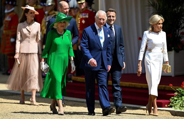 EDITORS NOTE: Graphic content / Britain's Catherine, Princess of Wales, Britain's Queen Camilla, Britain's Prince William, Prince of Wales and Britain's King Charles III walk with France's President Emmanuel Macron and his wife Brigitte Macron during a ceremonial welcome for them at Windsor Castle, in Windsor west of London, on July 8, 2025, on the first day of a three-day state visit to Britain. French President Emmanuel Macron began a three-day state visit to Britain on Tuesday, which will see him address parliament and try to rekindle a purportedly warm relationship with King Charles III. (Photo by Dylan Martinez / POOL / AFP)
