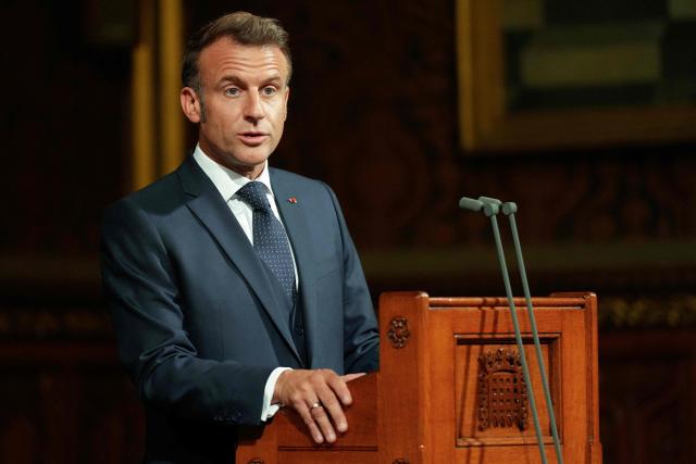 France's President Emmanuel Macron addresses Members of Parliament (MPs) during a visit to the Palace of Westminster, home to the House of Commons and House of Lords, in London on July 8, 2025, on the first day of a three-day state visit to Britain. French President Emmanuel Macron began a three-day state visit to Britain on Tuesday, which saw him address parliament and try to rekindle a purportedly warm relationship with King Charles III. (Photo by Alastair Grant / POOL / AFP)