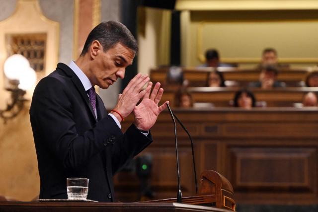 Spain's Prime Minister Pedro Sanchez addresses the chamber during a plenary session at the Spanish parliament in Madrid on July 9, 2025, to address corruption cases affecting the Spa nish Socialist Party (PSOE). (Photo by JAVIER SORIANO / AFP)
