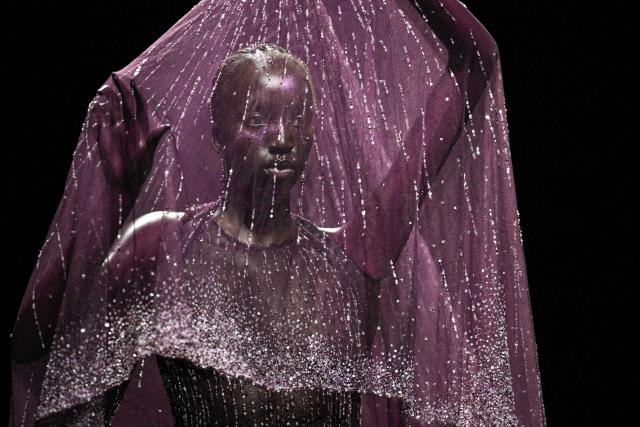 A model presents a creation for Robert Wun during the Women's Haute-Couture Fall/Winter 2025-26 collection show at the Theatre du Chatelet, in Paris, on July 9, 2025. (Photo by JULIEN DE ROSA / AFP)