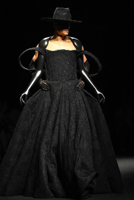 A model presents a creation for Robert Wun during the Women's Haute-Couture Fall/Winter 2025-26 collection show at the Theatre du Chatelet, in Paris, on July 9, 2025. (Photo by JULIEN DE ROSA / AFP)