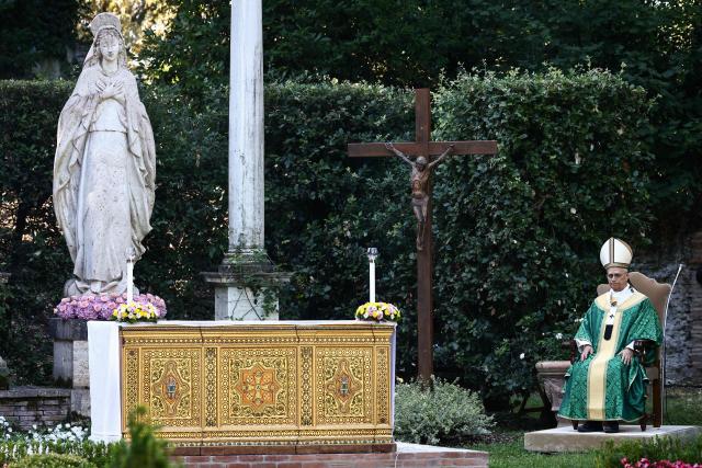 Pope Leo XIV sits as he leads the Mass for the Care of Creation in Castel Gandolfo, 40 km southeast of Rome on July 9, 2025. (Photo by Yara Nardi / POOL / AFP)