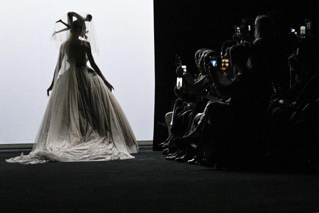 A model presents a creation for Robert Wun during the Women's Haute-Couture Fall/Winter 2025-26 collection show at the Theatre du Chatelet, in Paris, on July 9, 2025. (Photo by JULIEN DE ROSA / AFP)