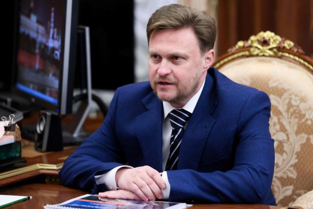 In this pool photograph distributed by the Russian state agency Sputnik, RusHydro General Director Viktor Khmar meets Russian President at the Kremlin in Moscow on July 9, 2025. (Photo by MIKHAIL METZEL / POOL / AFP)