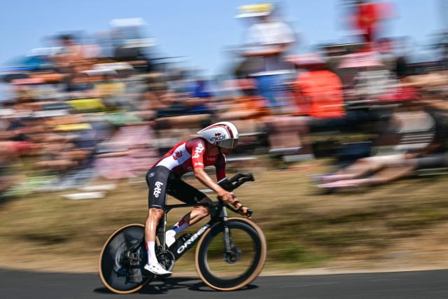 Lotto team's Belgian rider Brent Van Moer cycles during the 5th stage of the 112th edition of the Tour de France cycling race, 33 km individual time trial starting and finishing in Caen, northwestern France, on July 9, 2025. (Photo by Loic VENANCE / AFP)