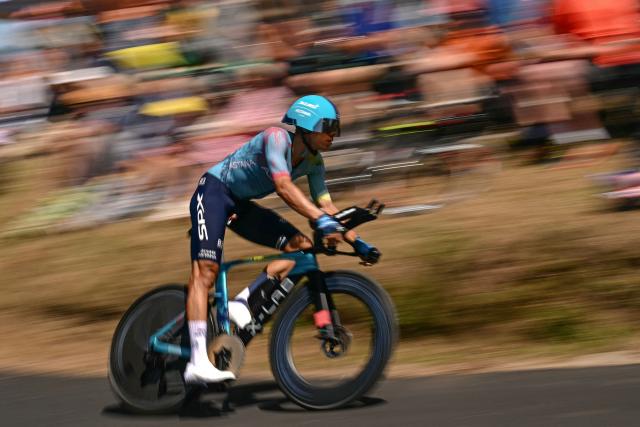 XDS Astana Team's Colombian rider Harold Tejada cycles during the 5th stage of the 112th edition of the Tour de France cycling race, 33 km individual time trial starting and finishing in Caen, northwestern France, on July 9, 2025. (Photo by Loic VENANCE / AFP)