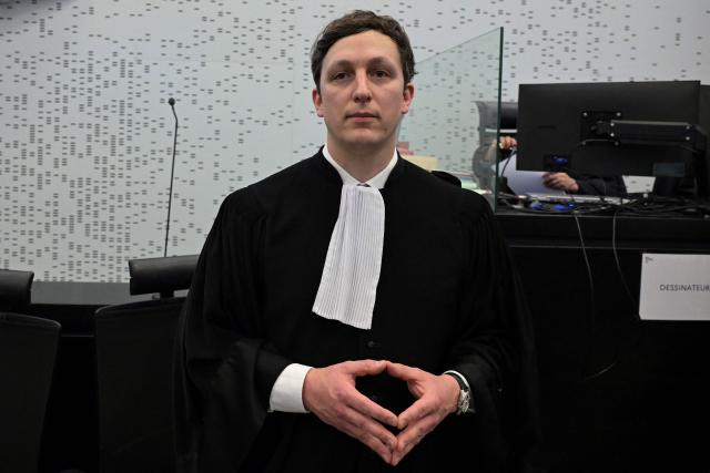 (FILES) Lawyer of retired surgeon Joel Le Scouarnec, Maxime Tessier waits in the Criminal Court, on the opening day of the four-month trial of his client on charges of assaulting or raping 299 patients in Vannes, on February 24, 2025. Maxime Tessier died in the night from July 8 to July 9, 2025, the Rennes public prosecutor's office said to AFP, as "an investigation has been opened into the circumstances of his death, with everything currently suggesting a suicide," according to the public prosecutor of Rennes, Frederic Teillet. (Photo by Damien MEYER / AFP)