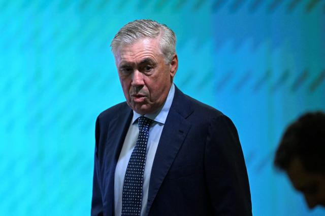 (FILES) Brazil's football team new head coach, Italian Carlo Ancelotti, walks on arrival for his official presentation at a hotel in Barra da Tijuca neighbourhood, Rio de Janeiro, Brazil, on May 26, 2025. Real Madrid ex-coach Ancelotti gets year's jail for tax fraud in Spain according to court, AFP reports on July 9, 2025. (Photo by Mauro PIMENTEL / AFP)