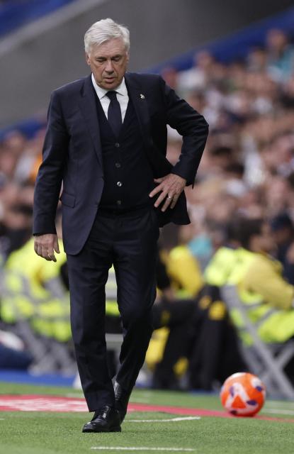 (FILES) Real Madrid's Italian coach Carlo Ancelotti is pictured during the Spanish league football match between Real Madrid CF and Real Sociedad at Santiago Bernabeu Stadium in Madrid on May 24, 2025. Real Madrid ex-coach Ancelotti gets year's jail for tax fraud in Spain according to court, AFP reports on July 9, 2025. (Photo by OSCAR DEL POZO / AFP)