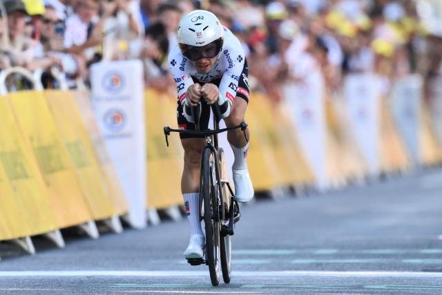 UAE Team Emirate - XRG team's Portuguese rider Joao Almeida cycles to the finish line of the 5th stage of the 112th edition of the Tour de France cycling race, 33 km individual time trial starting and finishing in Caen, northwestern France, on July 9, 2025. (Photo by Marco BERTORELLO / AFP)