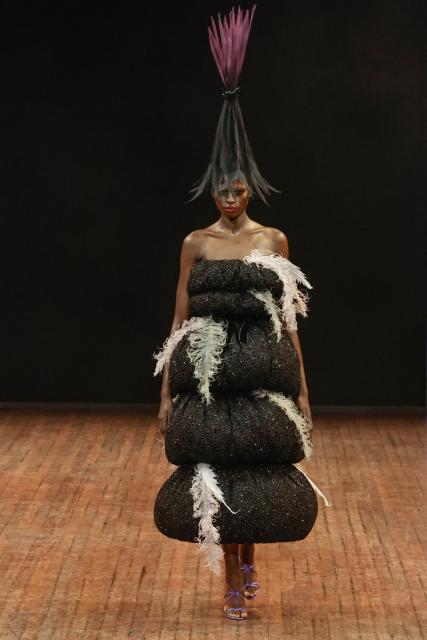 A model presents a creation for Viktor&Rolf during the Women's Haute-Couture Fall/Winter 2025-26 collection show in Paris, on July 8, 2025. (Photo by STEPHANE DE SAKUTIN / AFP)