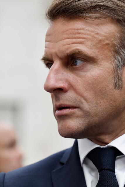 France's President Emmanuel Macron looks on during a visit to The British Museum in London, on July 9, 2025, on the second day of a three-day state visit to Britain. (Photo by BENJAMIN CREMEL / POOL / AFP)