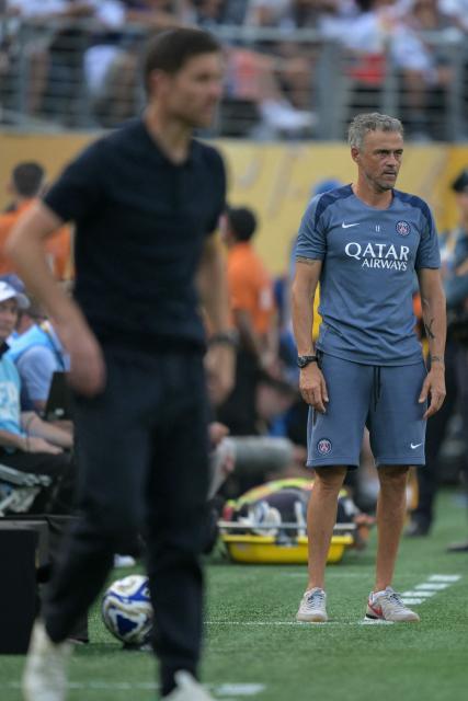 Paris Saint-Germain's Spanish coach Luis Enrique gestures during the FIFA Club World Cup 2025 semifinal football match between France's Paris Saint-Germain and Spain's Real Madrid at the MetLife stadium in East Rutherford, New Jersey on July 9, 2025. (Photo by JUAN MABROMATA / AFP)