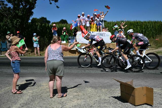 Lidl - Trek team's US rider Quinn Simmons (L) Tudor Pro Cycling Team's Australian rider Michael Storer (C) and Alpecin - Deceuninck team's Dutch rider Mathieu van der Poel (R) cycle in a breakaway during the 6th stage of the 112th edition of the Tour de France cycling race, 201.5 km between Bayeux and Vire Normandie, Northwestern France, on July 10, 2025. (Photo by Marco BERTORELLO / AFP)