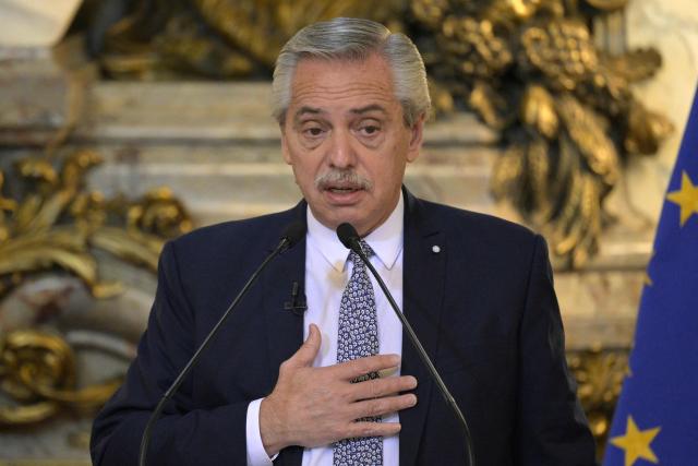 FILES) Argentina's President Alberto Fernandez speaks next to European Commission President Ursula Von Der Leyen (out of frame) during a press conference at Casa Rosada in Buenos Aires on June 13, 2023. An Argentine judge on July 10, 2025, ordered ex-president Alberto Fernandez to stand trial for alleged corruption relating to insurance policies taken out by government departments during his 2019-2023 term. Fernandez, 66, will be prosecuted for "negotiations incompatible with the exercise of public office," according to the judge's ruling published in local media and confirmed by defense lawyer Mariana Barbitta. (Photo by JUAN MABROMATA / AFP)