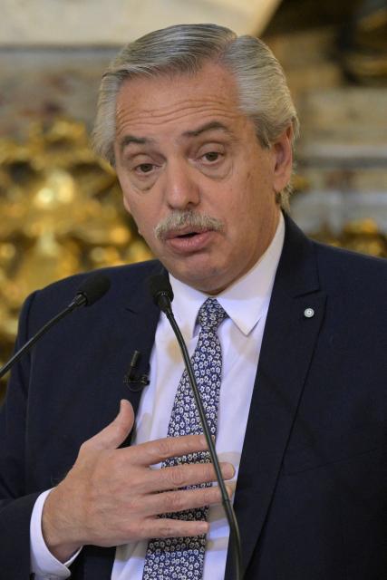 FILES) Argentina's President Alberto Fernandez speaks next to European Commission President Ursula Von Der Leyen (out of frame) during a press conference at Casa Rosada in Buenos Aires on June 13, 2023. An Argentine judge on July 10, 2025, ordered ex-president Alberto Fernandez to stand trial for alleged corruption relating to insurance policies taken out by government departments during his 2019-2023 term. Fernandez, 66, will be prosecuted for "negotiations incompatible with the exercise of public office," according to the judge's ruling published in local media and confirmed by defense lawyer Mariana Barbitta. (Photo by JUAN MABROMATA / AFP)